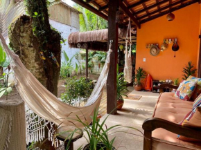 Casa aconchegante em Camburi, perto da praia, com garagem.